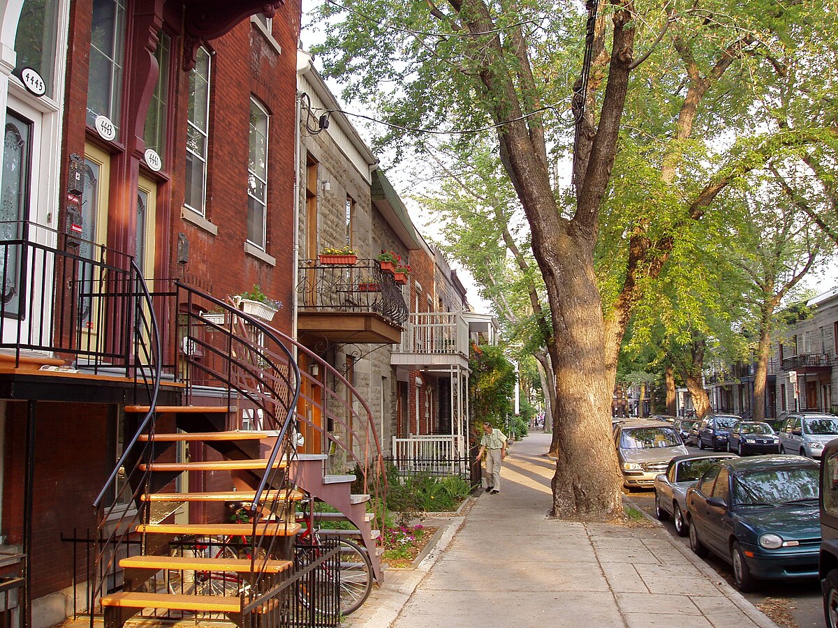 Typical Montreal street with row houses and exterior staircases in Plateau-Mont-Royal